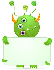 green smily monster with empty placard