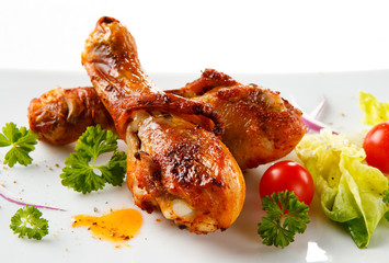 Roasted chicken drumsticks and vegetables