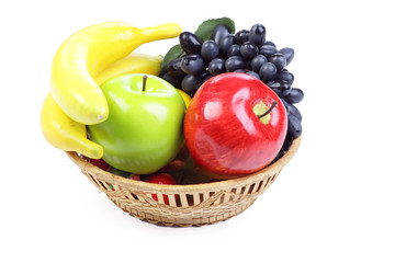Fruit basket isolated on the white background
