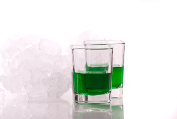 Green Dyed Liquor in Shot Glasses