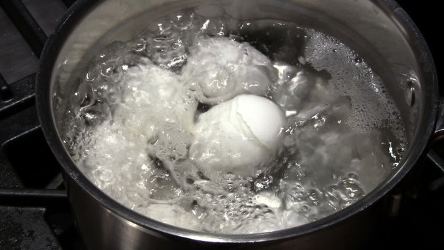 Eggs Boiling in Hot Water