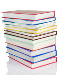pile of new books isolated on white