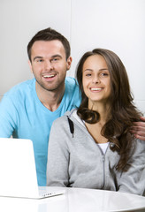 Young couple with laptop