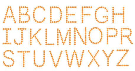 Alphabet from orange slices isolated on white