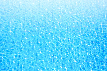Naklejka na ściany i meble blue swimming pool with ripple water and reflection
