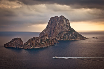 The beautiful little island of Es Vedra at sunset in Ibiza