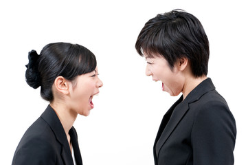 two asian businesswomen bellowing