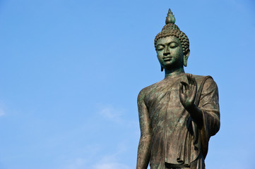 standing buddha statue
