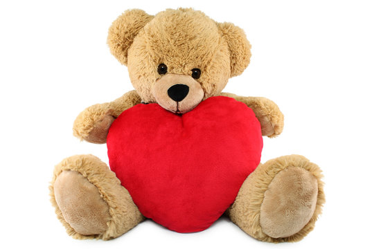 Ours brun en peluche et coeur rouge