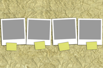 Four empty photographs with yellow notes