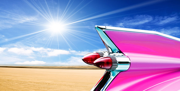 Pink Cadillac On Beach