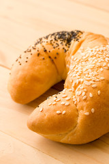 Bun isolated on wooden background