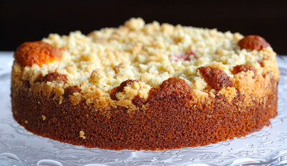 Crumble cake dish with steamed rhubarb fruit