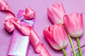 Tulips and gift box with ribbon