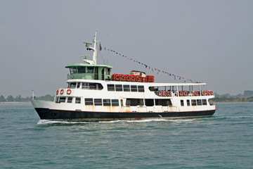 erry carries passengers and tourists to the island