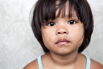 Young girl in the Philippines living in poverty