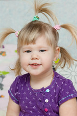 Little girl with funny tails