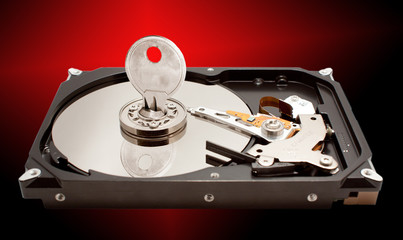 hard disk drive with secure data key and glowing red star on bla