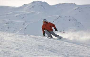 Naklejka na ściany i meble skiing on on now at winter season