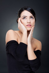 Fototapeta premium young woman looking up