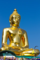 Fototapeta premium Golden Buddha under the open sky