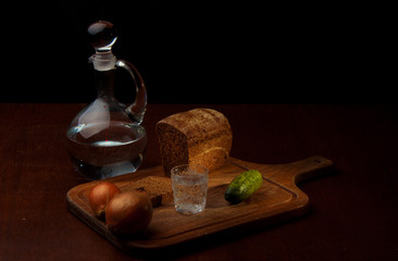 two onions, cucumber and rye bread