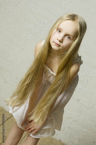 "Teen girl fashion model with long blond hair picture
