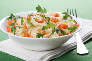 Pasta with tomato and rucola