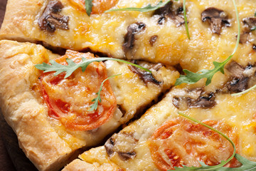 Pizza with mushroom and tomatoes