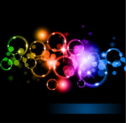 Glowing Circles of llight with Raibow Colours Background