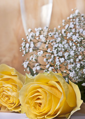 Yellow  roses and glass of wine