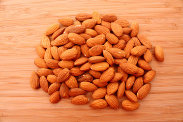 Almons on wooden surface