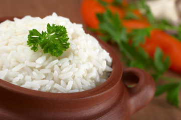 Cooked white rice garnished with parsley