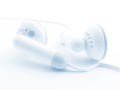 Small ear phones with music on a white background