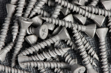Dark metal screw