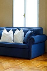Fototapeta na wymiar Blue sofa angle 2