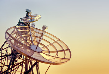 telecommunications tower at the sunset - obrazy, fototapety, plakaty