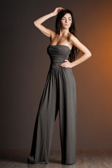 Fototapeta premium beautiful fashionable woman in grey clothes