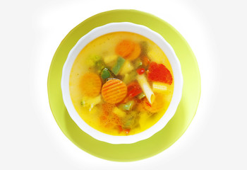 vegetable soup in a bright plate