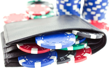 poker chips in black leather purse