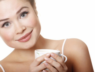 young attractive woman with cup on white background