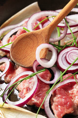 Pan frying pork and onion
