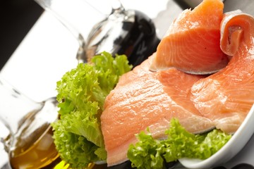 raw salmon fillet with lettuce