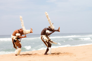 zulu dancers on beach - obrazy, fototapety, plakaty