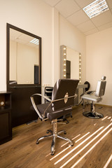 Modern salon make-up artist and hairdresser.