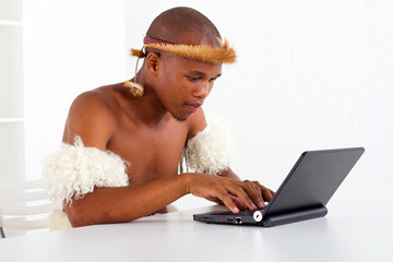 zulu man using computer