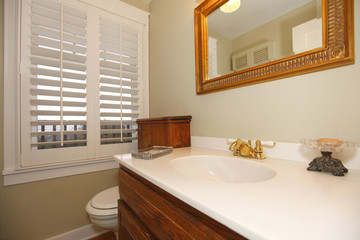 Tropical classic bathroom with white sink