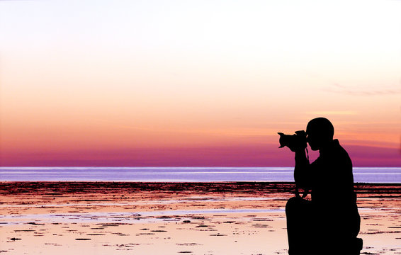 Fotograf am Strand