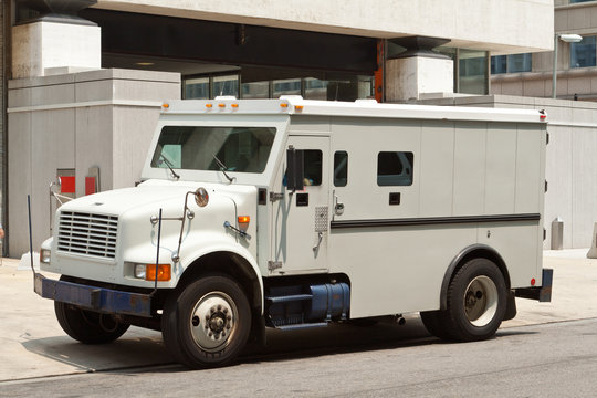 Armoured Armored Car Parked on Street Building