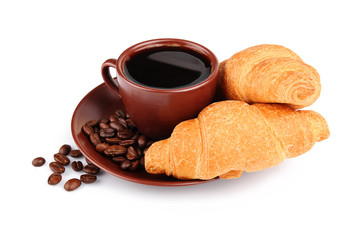 Croissants, cup of coffee and beans isolated on white